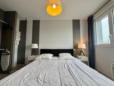 Un ou plusieurs lits dans un hébergement de l'établissement Domaine des 5 Roses - Rose Sombre