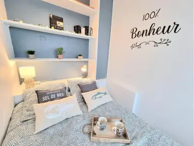 Un ou plusieurs lits dans un hébergement de l'établissement Les Petits Becs , joli T2 Vue mer, Wifi, Parking