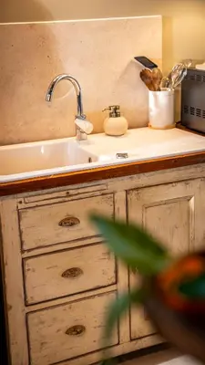 Cuisine ou kitchenette dans l'établissement Dépendance maison bourgeoise