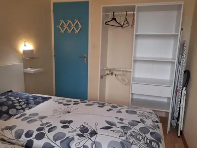 Un ou plusieurs lits dans un hébergement de l'établissement Vue sur la Plage des Demoiselles - Appt vue mer