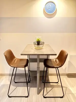 Coin salon dans l'établissement Escale - Maison - Nantes aéroport