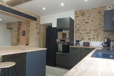 Cuisine ou kitchenette dans l'établissement La Cab'Anne