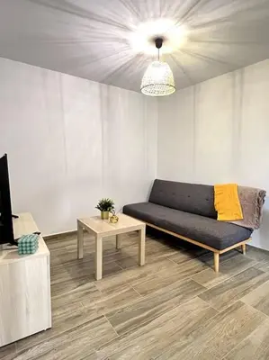 Coin salon dans l'établissement Puy duFou 15 min T3 L'étape du Panache