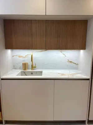Cuisine ou kitchenette dans l'établissement Le Triplex du Quai