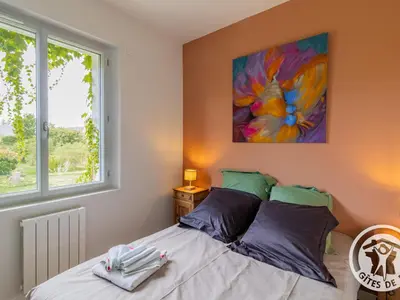 Un ou plusieurs lits dans un hébergement de l'établissement Maison rénovée avec jardin proche d'Angers - FR-1-622-92