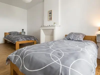 Un ou plusieurs lits dans un hébergement de l'établissement Maison rénovée avec wifi, centre bourg de St Mars la Jaille - FR-1-306-1289