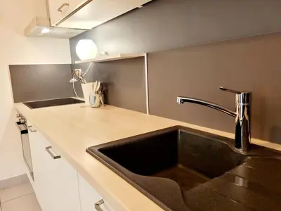 Cuisine ou kitchenette dans l'établissement Lil Bretech