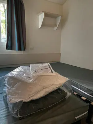 Un ou plusieurs lits dans un hébergement de l'établissement Camping Coeur de Vendée, la Boissière de Montaigu