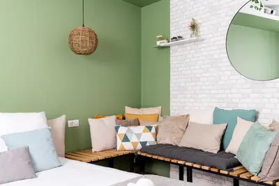 Coin salon dans l'établissement Unique ! Une nuit dans un jardin avec Ecran géant !