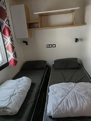 Un ou plusieurs lits dans un hébergement de l'établissement MH 805 Camping Bois Dormant