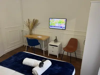 Télévision ou salle de divertissement dans l'établissement Relais de commerce
