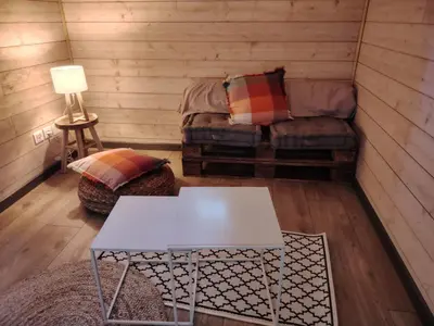 Coin salon dans l'établissement Les Gîtes C&H