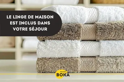 Un ou plusieurs lits dans un hébergement de l'établissement Le Nid Douillet - Duplex Bois & Charme