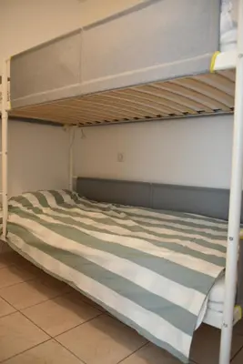 Un ou plusieurs lits dans un hébergement de l'établissement Maison douillette à 600m de la plage