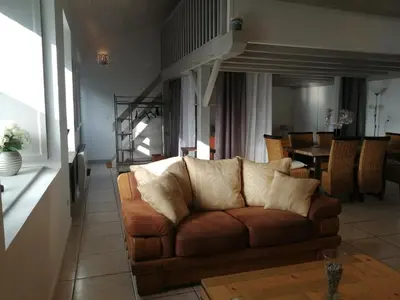 Coin salon dans l'établissement Loft la Forge