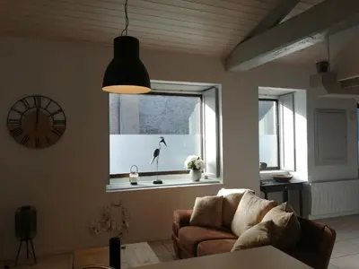 Coin salon dans l'établissement Loft la Forge