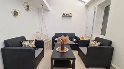 Coin salon dans l'établissement Jolie maison 5 minutes de l ocean