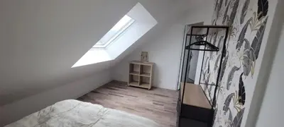 Un ou plusieurs lits dans un hébergement de l'établissement Maison confortable à Casson, 60 m², bien équipée