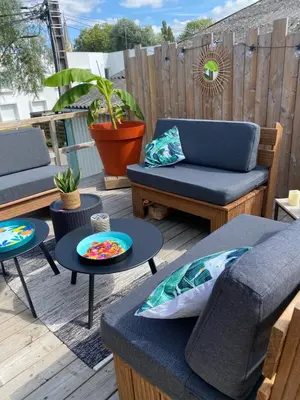 Coin salon dans l'établissement Appartement loft avec terrasse