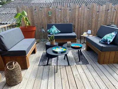 Coin salon dans l'établissement Appartement loft avec terrasse