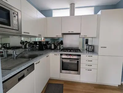 Cuisine ou kitchenette dans l'établissement Ker Maretz Appartement lumineux entre côte et parc