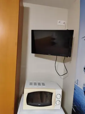 Télévision ou salle de divertissement dans l'établissement 2 pas de la mer