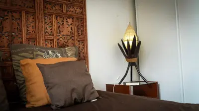 Un ou plusieurs lits dans un hébergement de l'établissement Chambre d'hôtes Sous Les Grands Chênes NOMADE