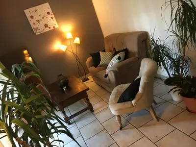 Coin salon dans l'établissement Chambre d'hôtes Sous Les Grands Chênes ZEN