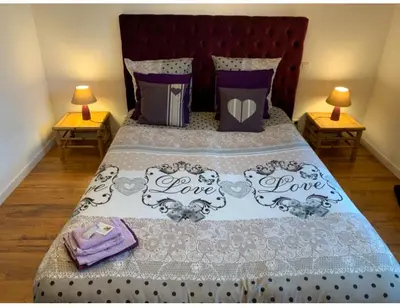 Un ou plusieurs lits dans un hébergement de l'établissement Chambre d'hôtes Sous Les Grands Chênes LOVE