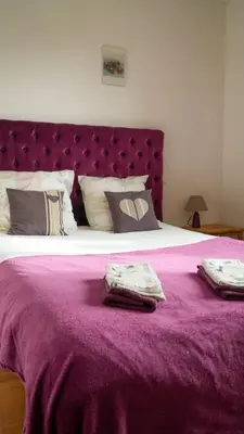 Un ou plusieurs lits dans un hébergement de l'établissement Chambre d'hôtes Sous Les Grands Chênes LOVE