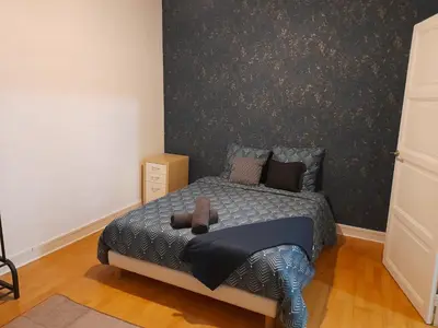 Un ou plusieurs lits dans un hébergement de l'établissement Sweet home