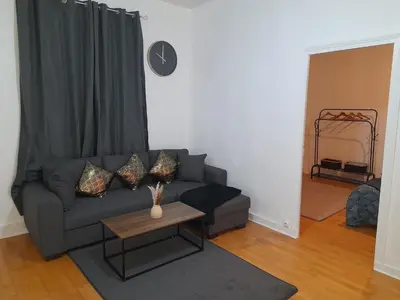 Coin salon dans l'établissement Sweet home
