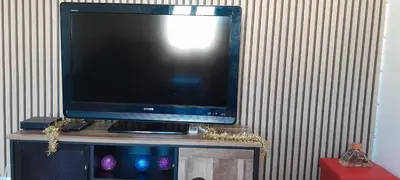 Télévision ou salle de divertissement dans l'établissement Sweet home