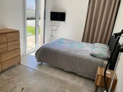 Un ou plusieurs lits dans un hébergement de l'établissement Maison familiale en bord de mer