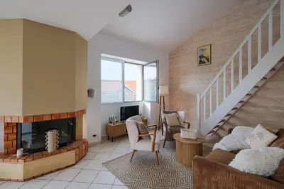 Coin salon dans l'établissement Côté Océan - Appt vue mer de 134 m2