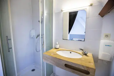 Salle de bains dans l'établissement La Chaumière