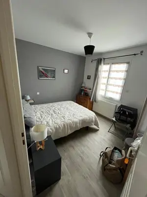 Un ou plusieurs lits dans un hébergement de l'établissement Maison familiale de plain pied, grande cour, vélos, très bien équipée