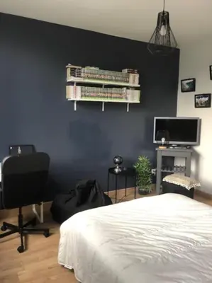 Un ou plusieurs lits dans un hébergement de l'établissement appartement indépendant dans jardin privé