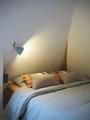 Un ou plusieurs lits dans un hébergement de l'établissement Studio de charme refait à neuf place Graslin