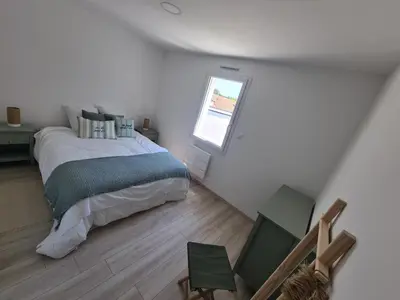 Un ou plusieurs lits dans un hébergement de l'établissement Maison proche de la coulée verte et commodités