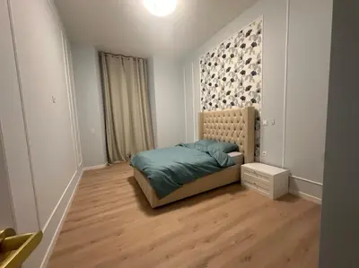 Un ou plusieurs lits dans un hébergement de l'établissement Appartement 4 chambres