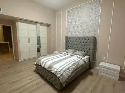 Un ou plusieurs lits dans un hébergement de l'établissement Appartement 4 chambres