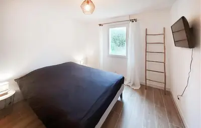 Un ou plusieurs lits dans un hébergement de l'établissement Beautiful Home In La Plaine Sur Mer