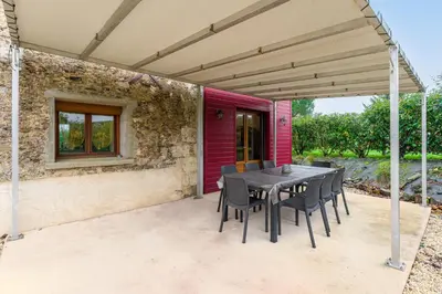Balcon ou terrasse dans l'établissement La Promesse des Saisons - Jardin et parking privé