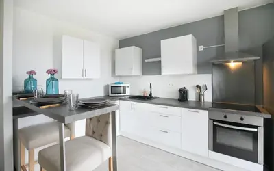 Cuisine ou kitchenette dans l'établissement Le BeeHive - T3 Spacieux et paisible