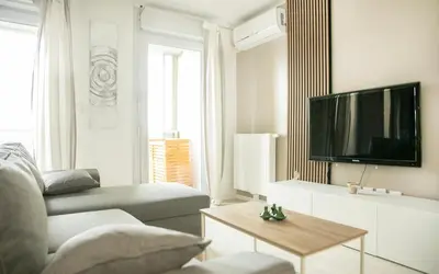 Télévision ou salle de divertissement dans l'établissement Le BeeHive - T3 Spacieux et paisible