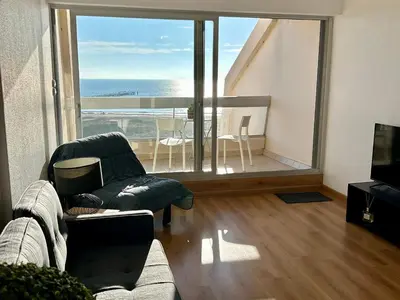 Coin salon dans l'établissement Studio confortable avec vue mer, animaux acceptés - FR-1-652-48