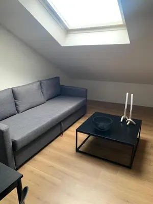 Coin salon dans l'établissement Appartement coeur de ville - 4 couchages