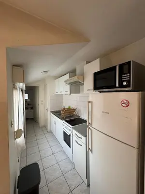 Cuisine ou kitchenette dans l'établissement Le Musset