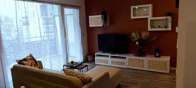 Télévision ou salle de divertissement dans l'établissement Le Portet avec parking privé